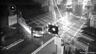 Sion Ramson drives over the level crossing