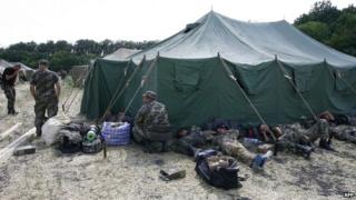 russia ukrainian war crimes soldiers camp near bbc officers arrests afp caption copyright monday