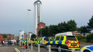 Police vehicles outside the Meridian Tower