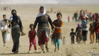 Displaced people from the minority Yazidi sect, fleeing violence