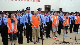 Обвиняемые предстанут перед судом в Яньтае, Шаньдун, 21 августа 2014 г.