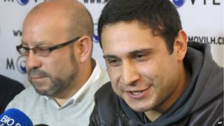 Mauricio Ruiz, 24, sailor of the Chilean Navy, right, comes out publicly as gay in Santiago, Chile, 27 August, 2014.