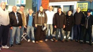 Football fans queuing to buy tickets