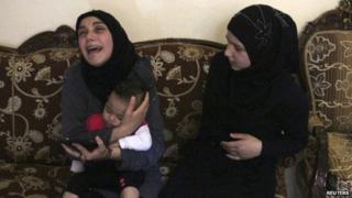The wife of Lebanese soldier Sgt Ali Sayyed mourns after being told that he has been beheaded by Islamic State militants (29 August 2014)