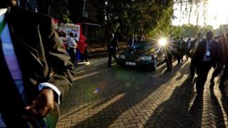 Kenyan presidential security escort President Uhuru Kenyatta's car - March 2013