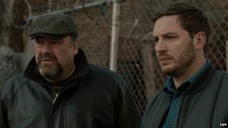 Still from The Drop showing Gandolfini and Hardy