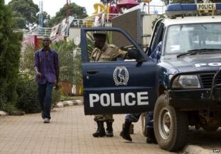 Ugandan police stand guard outside a popular shopping mall in the capital Kampala - 14 September 2014