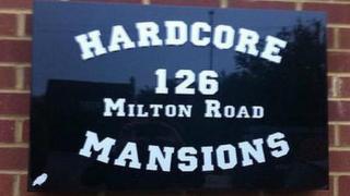 Hardcore Mansions sign