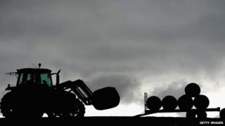 Tractor and silage bales