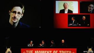 Edward Snowden, Julian Assange, Internet Party leader Laila Harre, Robert Amsterdam, Glenn Greenwald and Kim Dotcom discuss the revelations about New Zealand's mass surveillance at Auckland Town Hall