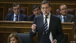 Spanish Prime Minister Mariano Rajoy gestures during the weekly government control session at Parliament in Madrid, on 10 September 2014.