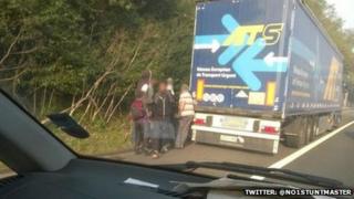 Suspected illegal immigrants on M25 in Surrey