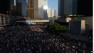 Hong Kong protestors rest after clashing the previous night with police