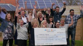 Fundraisers with large cheque