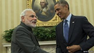 Indian Prime Minister Narendra Modi and Barack Obama shake hands in the White House.