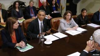US President Barack Obama speaks with members of his national security team and senior staff about the Ebola outbreak in West Africa,