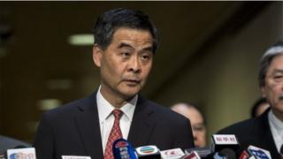 Hong Kong's Chief Executive CY Leung listens to a question at a press conference on political reform