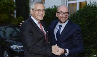 Charles Michel (R), here with coalition colleague Kris Peeters, will be Belgium's youngest PM since 1841