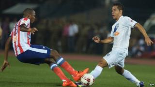 Atletico de Kolkata's Ofentse Nato during a tackle with Mumbai City's Lalrindika Ralte on Sunday