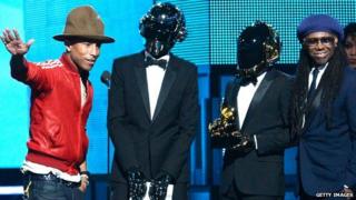 Daft Punk with Pharrell Williams (l) and Nile Rodgers at the 2014 Grammys