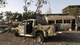 Destroyed vehicles in Benghazi, July 2014