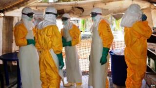 Health workers in Guinea, Sept 25