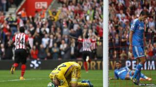 Vito Mannone of Sunderland looks dejected after the eighth goal is scored by Sadio Mane of Southampton during the Premier League match between Southampton and Sunderland at St Mary's Stadium on October 18, 2014