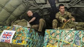 UK humanitarian aid being loaded onto a RAF Hercules C130 at RAF Brize Norton destined for Iraq