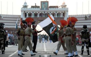 Indian and Pakistani soldiers participate in the ceremony on the Wagah border