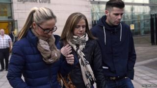 Family members including Mrs Millican's daughter Suzanne (left) pictured leaving court after sentencing