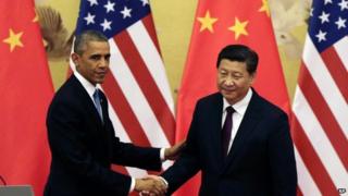 Barack Obama (L) and Xi Jinping have announced new targets on greenhouse gas emissions