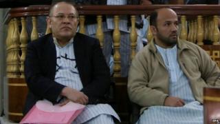 Sherkhan Farnood and Khalilullah Ferozi appear in court in Kabul