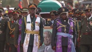 The coffin of the late Zambian President Michael Sata is draped in Zambia's flag at the funeral in Lusaka, Tuesday, 11 November 2014
