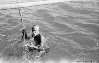 A diver draws breath. photograph taken by Alan Villiers