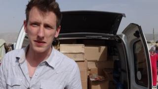 File photo: Peter Kassig in front of a truck somewhere along the Syrian border between late 2012 and autumn 2013