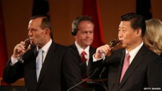 Chinese President Xi, Jinping right, and Australian PM Tony Abbott pledged to further boost bilateral ties