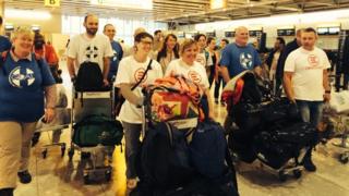 The group of NHS volunteers preparing to check in