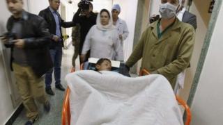A boy receives treatment at a military hospital in Kabul, after being wounded during a suicide attack at a volleyball match on Sunday in the Yahya Khail district of Paktika province, November 24, 2014