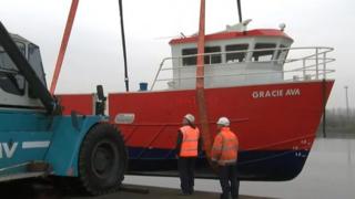 Gracie Ava is lowered into the Tees