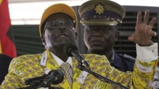 Zimbabwean President Robert Mugabe delivers his speech during the official opening of the Zanu-PF congress in Harare on 4 December 2014
