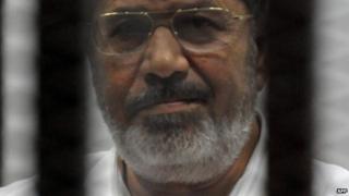Mohammed Morsi at his trial