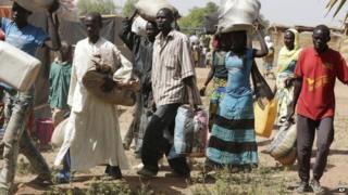 Civilians who fled their homes following an attack by Islamist militants, in Gwoza arrived at the camp for internally displaced people in Yola, Nigeria, on 27 November 2014