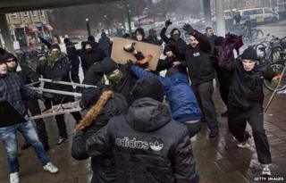 Right-wing extremists attack an anti-Nazi demonstration in the Stockholm suburb Karrtorp, Sweden, on December 15, 2013