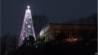 Christmas tree tower lit up at the western mountain peak known as Aegibong in Gimpo, South Korea (Dec 2010)