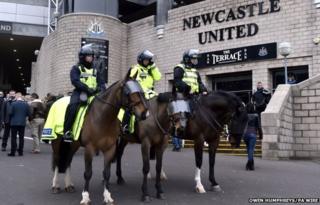Police officers on horseback