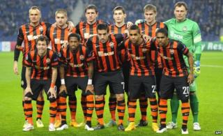 Shakhtar Donetsk players warm up during a training session at the Dragao Stadium in Porto, on December 9, 2014, on the eve of the UEFA Champions League football match against FC Porto.