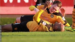 Chris Zebroski of Newport County celebrates scoring their first goal with Adam Chapman