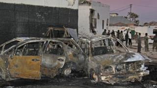 Wreckage at the scene of a car bomb attack in Mogadishu, Somalia, 4 January