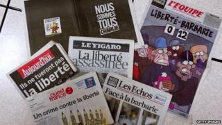 Photo taken in Rennes on January 8, 2015 shows the front pages of French newspapers after the attack by gunmen on French satirical weekly Charlie Hebdo in Paris
