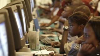 Young Ivorian learn how to use a computer on 22 April 2004 in Abidjan